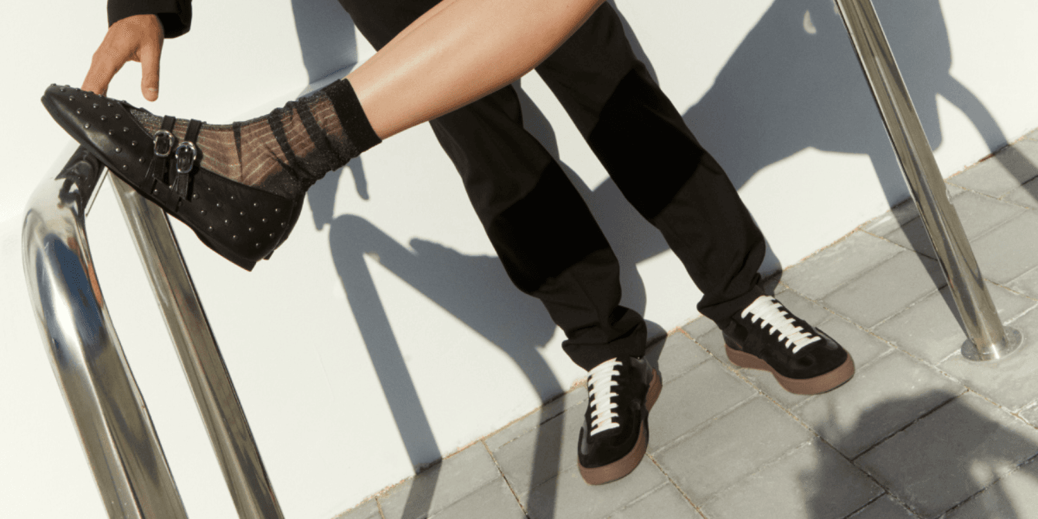 black Nubikk sneakers on feet